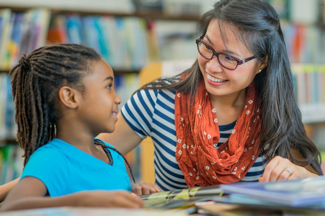 Teacher And Student Reading